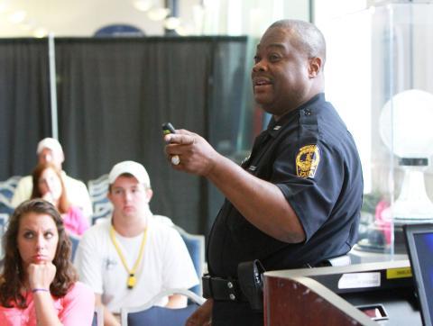 Officer presents wellness and safety at New Student Orientat